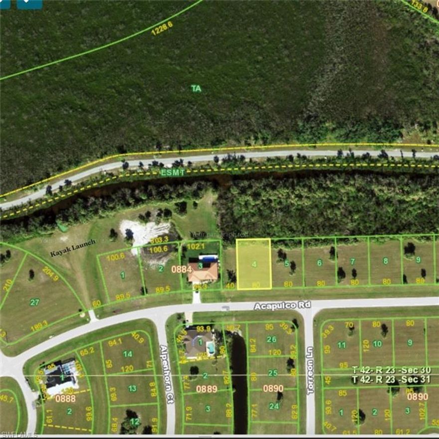 Rare Opportunity – Build Your Dream Home Next to Protected Green Space! Discover a unique opportunity to own a premium lot nestled beside a serene, protected green space in the desirable Burnt Store Lakes community. This rare find offers added privacy—nothing can ever be built on the adjacent greenbelt, giving you a sense of openness that’s hard to come by. Located at the back of the property is a lush wooded area with mangroves with a view of Ber Branch Creek, eventually leading to Charlotte Harbor, creating a beautiful natural buffer and tranquil backdrop. This lot is ideally situated just four lots away from the community kayak launch, offering direct water access to Charlotte Harbor—perfect for kayaking, fishing, and exploring the beautiful Florida waterways. Within 10 min you are paddling to Charlotte Harbor. The kayak launch is well maintained with artificial grass to launch your vessel.  Burnt Store Lakes is a deed-restricted community known for its natural beauty and relaxed Florida lifestyle. Enjoy: 11 peaceful lakes, scenic walking and biking paths, a family-friendly park with a playground, & spacious pavilions for picnics and social gatherings. Just down the road, Burnt Store Marina—the largest deepwater marina in Southwest Florida—offers boating, dining, and golf just minutes from your future doorstep. Conveniently located near: Downtown Punta Gorda, Sunseeker Resort, Shopping & dining, Medical facilities, and Ft. Myers & Punta Gorda Airports. Own your piece of paradise in Burnt Store Lakes—where natural beauty, community charm, and coastal living come together. Call today to schedule your personal tour and see the potential for yourself!