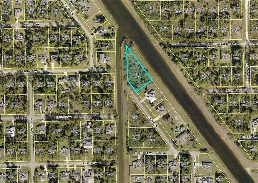 huge 1/2 acre lot with canals on both sides, the able and salmon canal.. this is a very unique property build your dream home  on a dead end street with water front views surrounding property. over sized with plenty of room for boats and toys to park.  very few lots like this available.