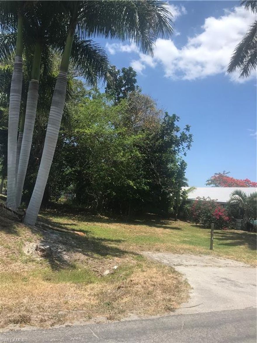 LOCATION, LOCATION, LOCATION ~ Build your dream home in the heart of Naples! This vacant lot is located in a quaint residential neighborhood nestled between Goodlette Rd and US41 with desirable schools zones, NO HOA fees and within 1 mile to Naples’ pristine white beaches, world class shopping and dining.