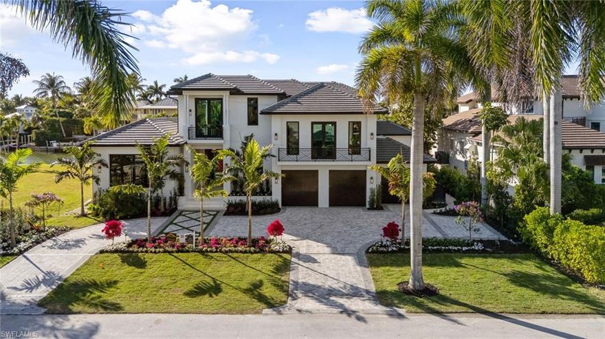 This is the one you have been waiting for. A rare, custom built new construction residence showcasing timeless features and bespoke finishes, set within the highly sought-after Aqualane Shores, one of Naples’ most prestigious enclaves.
 
Highlights include a first-floor primary wing with a spa inspired bath, an inviting waterside lounge and bar, and extraordinary outdoor living spaces overlooking wide western exposure canal views. Designed by the celebrated team at Amy Storm and Company, envisioned by renowned architect Jon Kukk, and expertly executed by C&E Builders, this luxury residence exudes effortless sophistication. Natural materials and serene, layered neutral tones are thoughtfully integrated throughout, creating a timeless aesthetic that complements any design style.
 
An elevator provides seamless access to every level, enhancing everyday living. Inside, bright and airy interiors are complemented by wide plank white oak floors, adding warmth and refined elegance throughout. The gourmet kitchen is a chef’s dream, showcasing a custom stone hood, a La Cornue range, top-tier appliances, and a butler’s pantry.
Step outside to your private oasis, where an expansive lanai is designed for entertaining and features a fully equipped outdoor kitchen, fireplace, and generous gathering space. Relax by the sparkling pool and spa, unwind beneath the pergola with a daybed, or gather around the fire pit under the stars - creating an inviting setting for memorable evenings.
For tech enthusiasts, the home is equipped with a state-of-the-art, high end AV system that delivers an immersive entertainment experience throughout the residence. Boaters will appreciate the direct Gulf access, making this a true waterfront retreat. Ideally located just moments from Naples’ pristine beaches, along with the world-class shopping and dining of 3rd Street South and 5th Avenue South, this home offers the perfect balance of luxury, convenience, and serene coastal living. This exceptional residence must be seen to be truly appreciated.