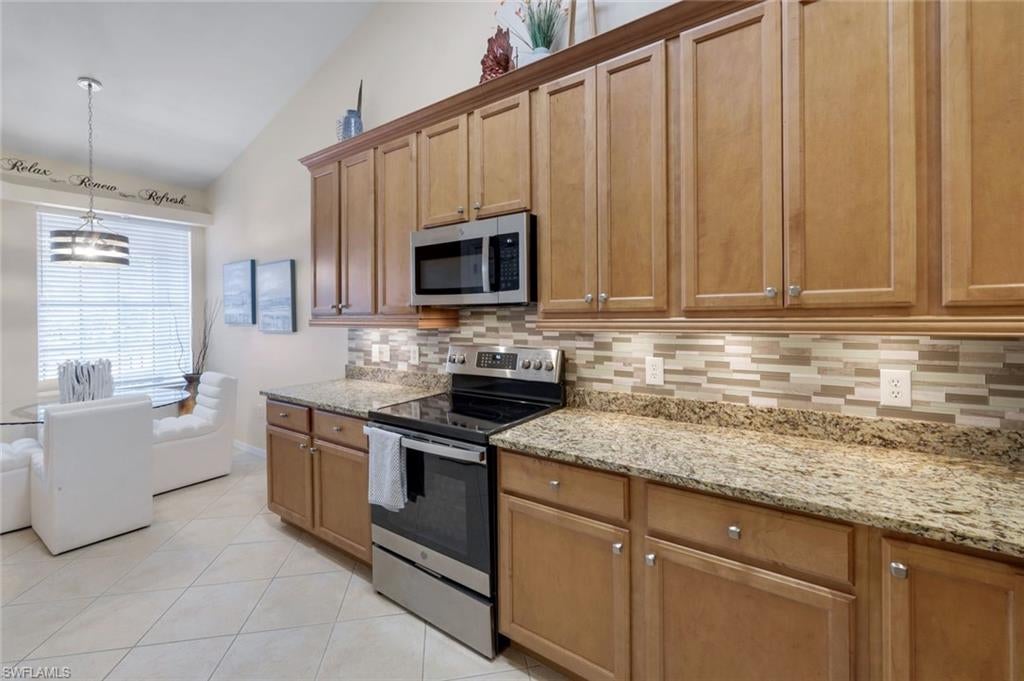 Photo of 12005 Matera LN #202, BONITA SPRINGS, FL 34135 (MLS # 226026608)