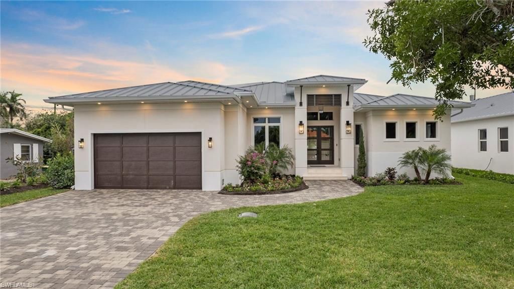 Photo of 766 95th AVE N, NAPLES, FL 34108 (MLS # 226010628)