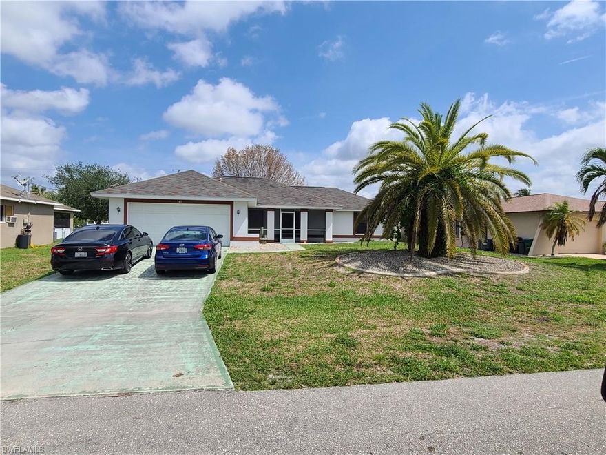 All assessments are paid!!!  3bed/2bath home in this quiet and highly desired Cape Coral neighborhood.  Floors are tile and wood.  French doors lead to the screened in lanai and yard is fenced!