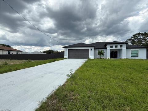 Photo of 2804 46th ST SW, LEHIGH ACRES, FL 33976 (MLS # 226017704)