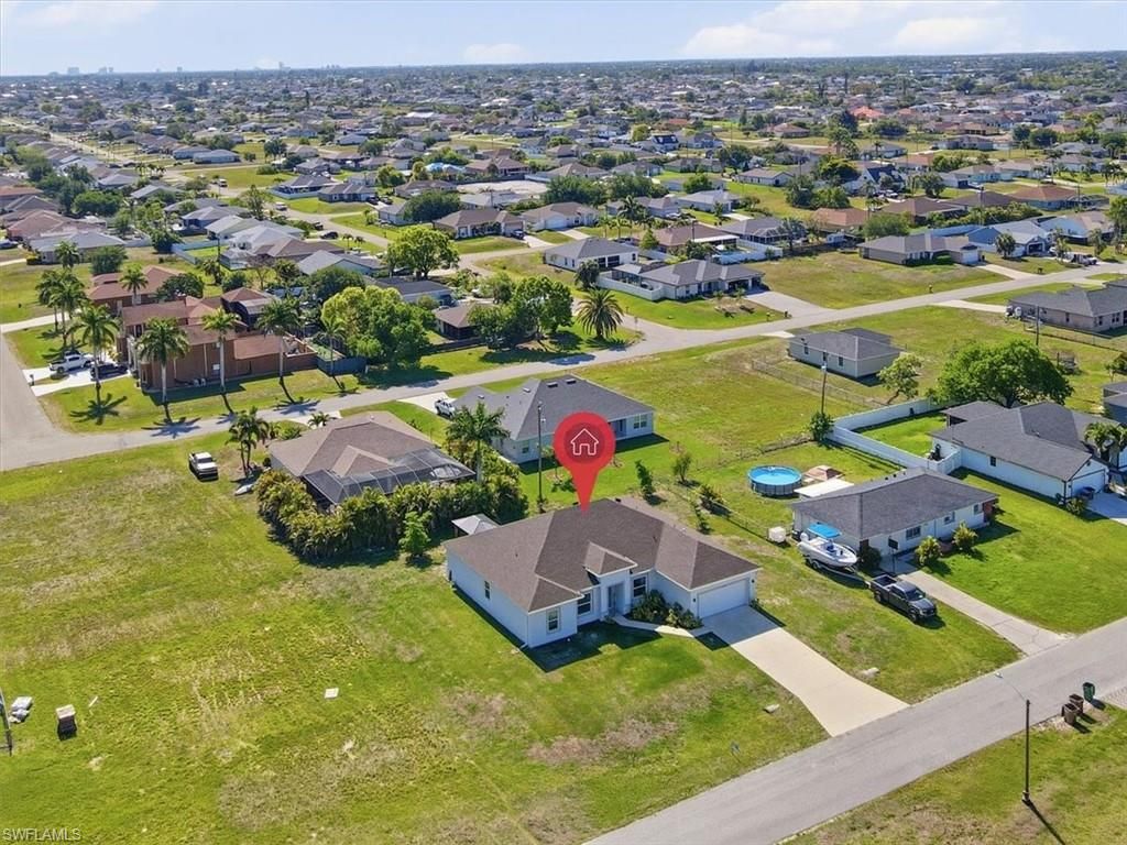 Photo of 1025 NW 7th PL, CAPE CORAL, FL 33993 (MLS # 226016480)