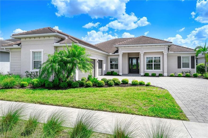 Nestled within the prestigious gated enclave of Babcock National, this exceptional bundled golf residence captures everything buyers dream of in Southwest Florida living. Perfectly positioned just two homes from the clubhouse, the location alone is something truly special—close enough for a short, effortless stroll to morning coffee, an afternoon round of golf, dinner with friends, or an evening cocktail overlooking the course.

This 4-bedroom, 3-bath home features great room living, tile flooring throughout, stainless steel appliances, and a 3-car garage. The bright open layout is enhanced by desirable southeastern rear exposure, bringing in excellent natural light.

Set on a 75-foot wide frontage homesite, the property offers outstanding golf course and lake views. The outdoor living area includes a gas-heated pool and spa along with an outdoor kitchen, creating a perfect space for relaxing or entertaining.

Bundled golf ownership includes access to the community’s 18-hole championship golf course along with resort-style amenities, including a community pool and spa, clubhouse dining, exercise room, putting green, pickleball, and tennis courts.

This home combines a premium lot, excellent location, and one of the best amenity packages in Babcock National.