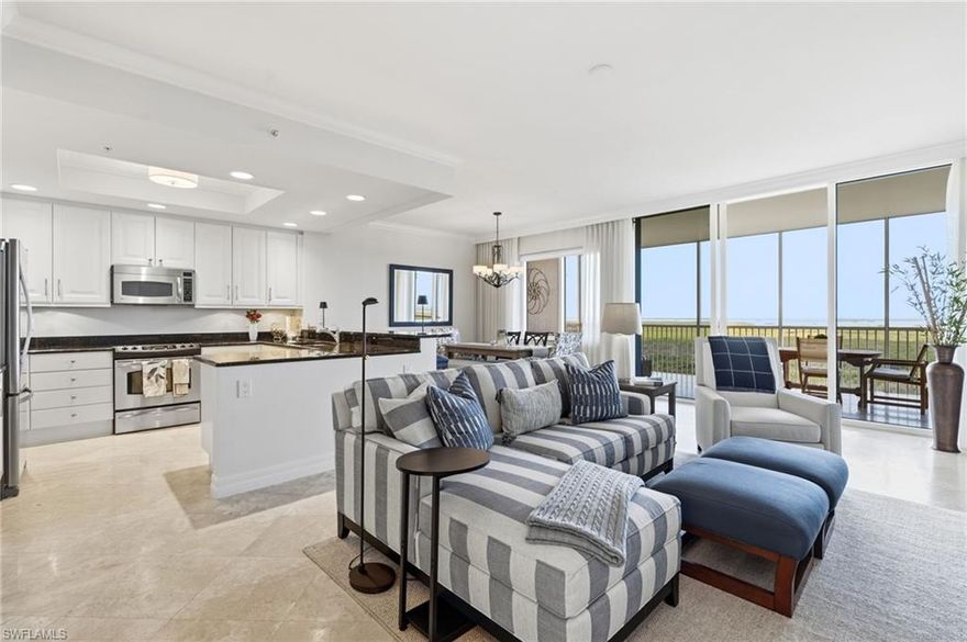 Experience refined coastal high-rise living in this 3-bedroom, 3-bath residence in Jasmine Bay South at West Bay Club. A private elevator opens into your own foyer, introducing 1,766 square feet of light-filled living space designed for both comfort and effortless entertaining.

The thoughtfully designed kitchen features granite countertops, quality appliances, and elegant cabinetry that blend style and function beautifully. Travertine flooring flows throughout the main living areas, adding warmth and timeless appeal, while plantation shutters throughout the residence enhance both privacy and coastal charm. The spacious living and dining areas transition seamlessly to the outdoors, creating an inviting setting for everyday living and hosting guests alike.

Enjoy sweeping western views and breathtaking Gulf sunsets from the expansive lanai, along with peaceful eastern sunrise views from the private balcony—perfect for morning coffee or evening relaxation. With generous bedroom suites, refined finishes, and access to exceptional resort-style amenities, this residence offers an elevated lifestyle in one of the area’s most desirable communities. Residents of Jasmine Bay enjoy resort-style amenities including a private fitness center, clubroom, card room, movie theater, and a spectacular infinity-edge pool with spa. Poolside cabanas and gas grills provide the perfect setting for outdoor gatherings, and four spacious guest suites accommodate visiting family and friends with ease. 

Beyond the tower, West Bay Club offers an unmatched lifestyle. The newly built private Beach Club on the Gulf of Mexico features beachfront dining, a full-service bar, and chair and towel service. The renovated Bay House includes a resort-style pool, yoga and Pilates studios, spinning and stretching rooms, sauna, and the Aqua Café for indoor or poolside dining. Additional amenities include eight clay tennis courts, a state-of-the-art Technogym fitness center, and River Park on the Estero River with Gulf access via boat launch, fishing pier, kayak and canoe launch, storage, playground, basketball court, picnic areas, and a scenic walking trail. The Sports Park features pickleball courts, bocce courts, a fitness lawn, and two dedicated dog parks. Optional memberships are available for the private 18-hole championship golf course designed by Pete and P.B. Dye, along with its clubhouse amenities. This residence offers a rare blend of nature, luxury, recreation, and convenience — all within one of Southwest Florida’s most sought-after communities.