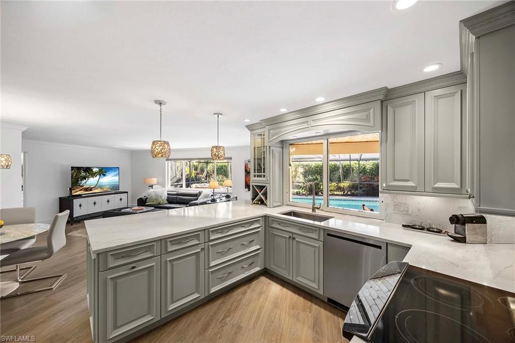 Photo of 688 Parkview LN, NAPLES, FL 34103 (MLS # 226004586)