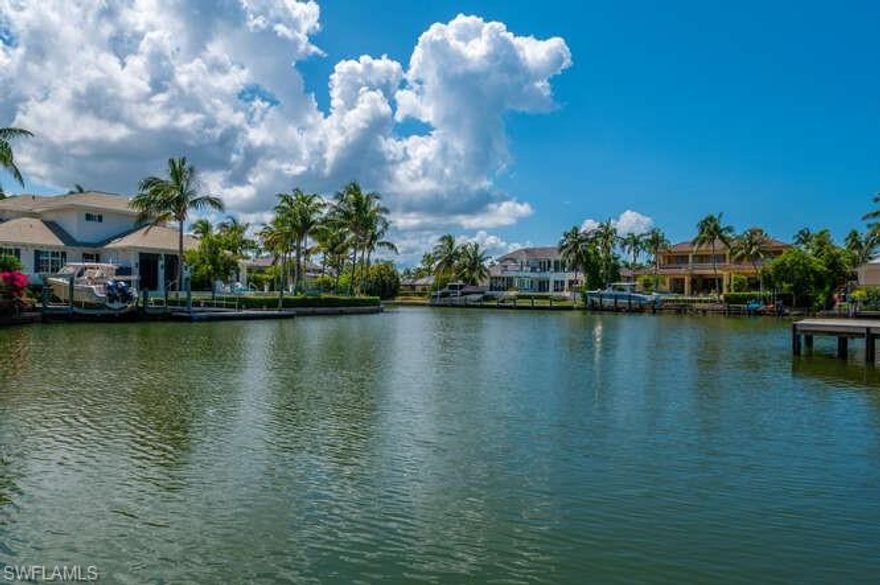 Welcome to Aqualane Shores, one of Naples' most prestigious waterfront communities! This breathtaking vacant lot offers a rare opportunity to build your dream home on Heron Cove. Heron Cove is the widest and deepest cove in Aqualane Shores, providing direct access to Naples Bay and the Gulf of Mexico. Situated on a quiet cul-de-sac, this lot boasts 110 feet of water frontage. The lot has been cleared, enabling you to design and build a custom home that perfectly suits your lifestyle. Aqualane Shores is known for luxurious living within walking distance to beautiful white sandy beaches, the Naples Pier, and unique dining, shopping, and entertainment in Olde  Naples,  specifically, 3rd Street South.