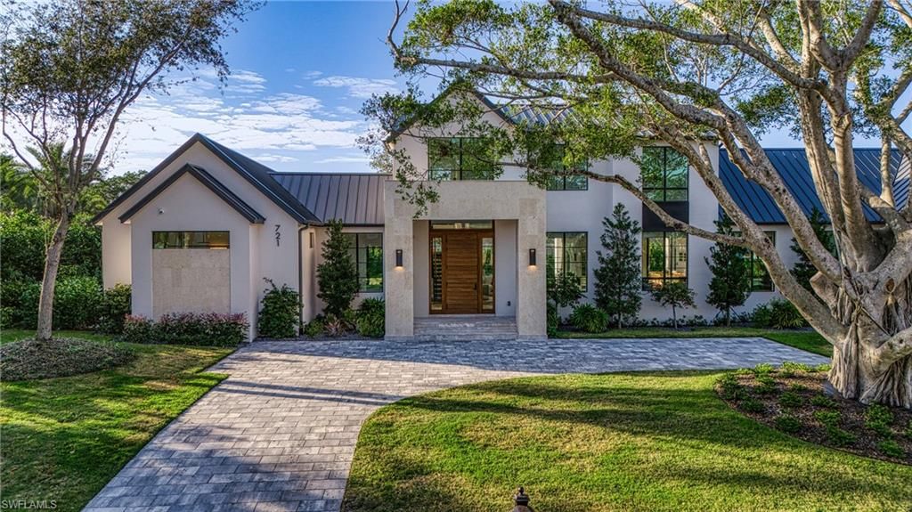 Photo of 721 Spring Line DR, NAPLES, FL 34102 (MLS # 224025203)