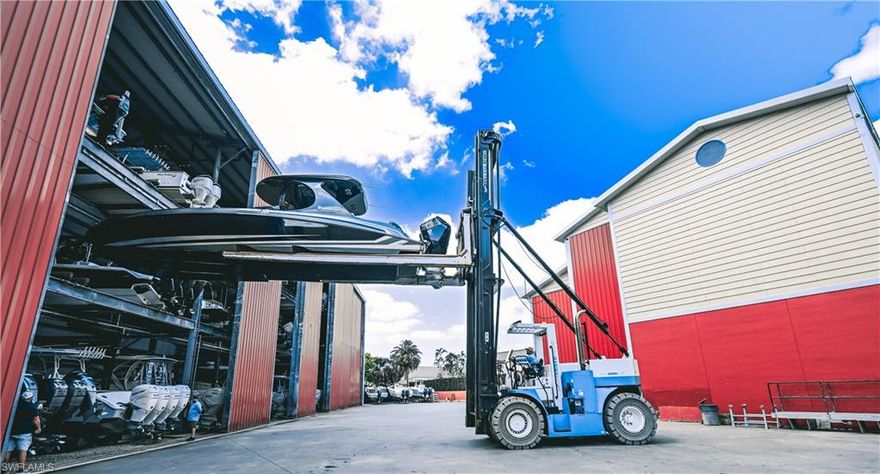 Discover the ideal haven for your boat with this expansive dry slip, measuring an impressive 42 feet in length, 15 feet in width, and 13 feet in height. Conveniently situated just minutes from the Gulf, without any bridges to navigate, this slip provides unmatched accessibility for your ocean adventures. Enjoy the luxury of owning a slip with unlimited in-and-out service, ensuring your boat is always prepared for a day of maritime fun. Simply call ahead, and your vessel will be ready for your enjoyment. The facility offers premium amenities, including a heated swimming pool, an exclusive members-only clubhouse, and accessible ice machines, delivering everything needed for a seamless boating experience. Safeguard your investment by storing your boat within this dry rack boat barn, providing peace of mind and exceptional protection from the elements. Seize this opportunity to own a sought-after dry slip in such a prime location. Contact us today to turn this dream into reality!