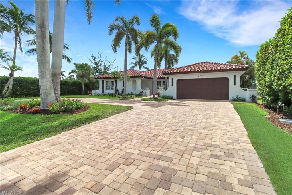 Photo of 2105 Sheepshead DR, NAPLES, FL 34102 (MLS # 225069719)