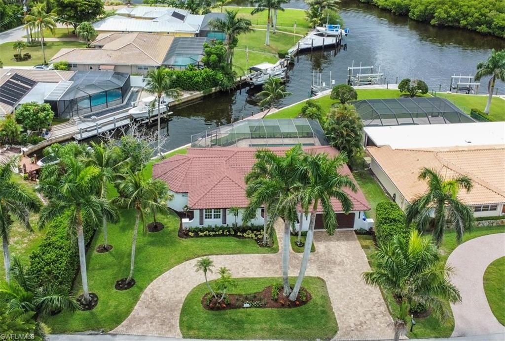 Photo of 2105 Sheepshead DR, NAPLES, FL 34102 (MLS # 225069719)