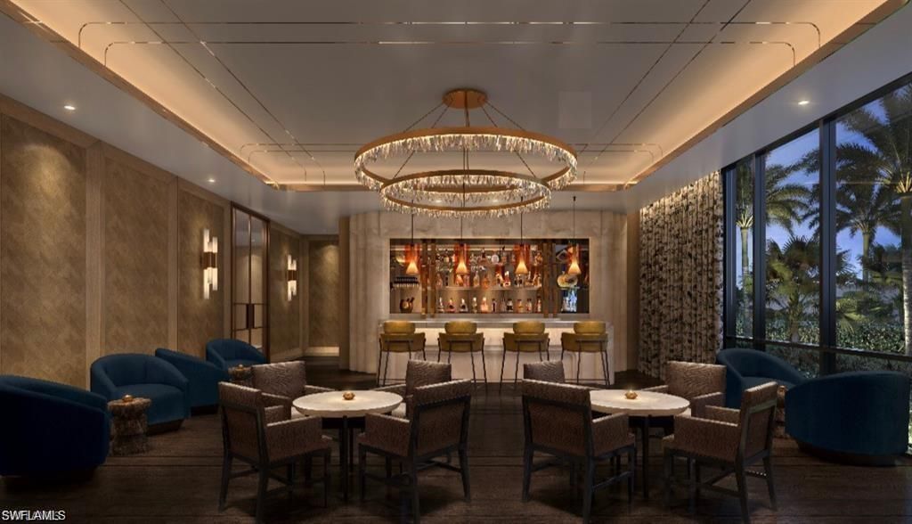 Photo of 6869 Grenadier BLVD #703, NAPLES, FL 34108 (MLS # 225055768)