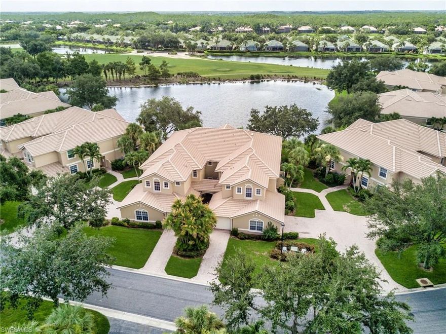 This gorgeously renovated, furnished condo offers the best views and location in Shadow Wood over 3 lakes and angled down the fairway for a truly breathtaking view. The kitchen has been spectacularly renovated with stunning quartz counter tops, stainless steel appliances and modified to add additional cabinetry, counter space and a wine cooler. Quality 42” easy close cabinets have crown molding and pull out drawers.  Electric storm smart screen have been added to the lanai. In total the home has over $80k in renovations.The building is conveniently located directly across from the community pool. Palmetto Ridge is one of the smaller condo subdivisions in Shadow Wood and a lot of the time the community pool will feel like your own private pool.  This is one of the best condos you will ever find in Shadow Wood. It has it all from location to view to outstanding features. Shadow Wood CC has 3 championship golf courses, 9 Har Tru tennis courts, 2 club houses, bocce, pickle ball, access to private beach club, fitness center, full service spa and much, much more!