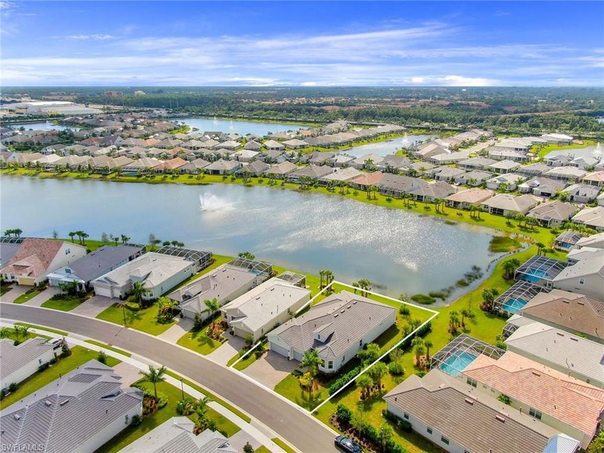 Location , Location, Location, Beautiful water front lot.  This house has all the high end appointments you should expect to include, 13 foot ceilings, gourmet quality upgraded kitchen with stainless steel appliances a gas 5 burner stove, led under cabinet lighting, designer lighting fixtures and fans, porcelain planking floors, crown molding, 12 foot barn doors, Impact glass throughout the home, Double impact glass front doors, oversized garage with ceiling storage and WIFI enabled garage door opener, luxurious outdoor kitchen with built in grill, side burner, sink, refrigerator, stainless steel vent, WIFI extender entire home,  storm smart hardwired hurricane shades, and this home is prewired for a pool. 
Tidewater is an active 55+,  Grand amenity center includes a coastal themed clubhouse, resort-style pool, outdoor barefoot bar, activities director, tennis, bocce, pickleball, exercise room, yoga studio, dog park & community garden. Tidewater is located in the heart of Estero and short distance from all major shopping beaches, FGCU and RSW Airport