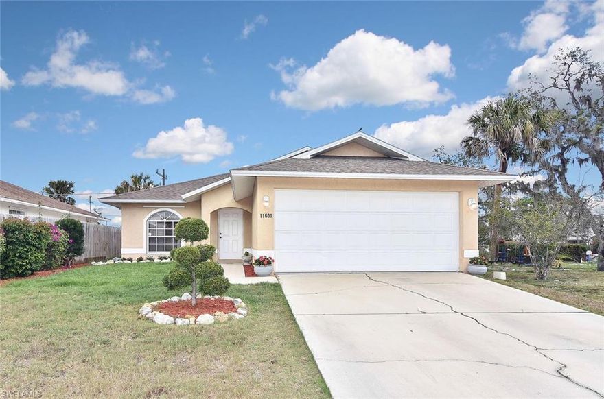 Come check out this beautiful home located in the highly desirable heart of Bonita Springs, Florida! It is only a short drive from our sandy gulf beaches, I-75, and plenty of shopping and dining. This three bedroom two bath home has been recently landscaped with new mulch and a well-maintained lawn that enhances the charming facade. Inside is a spacious kitchen with stainless steel appliances and upgraded sink features, including a new garbage disposal and faucet. Part of the garage has been converted into an air-conditioned bonus room that is perfect for a home office or extra storage area. In addition, the A/C unit was fully replaced in 2013. Out back is a freshly painted patio where you can kick back and relax while also enjoying your privacy from the enclosed wood fence. Schedule your appointment today - this home won't last long