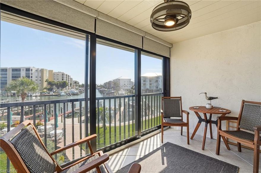 Waterfront Corner Residence with Direct Intersecting Canal Views! This beautifully redesigned second-floor 1-bedroom, 2-bath corner/end unit offers sweeping water views from three sides and expanded indoor living space after opening the lanai under air. Thoughtfully curated with a coastal-inspired interior and high-end finishes, this residence delivers both style and function. Notable Upgrades & Features: •Hurricane impact doors & windows •Plantation shutters throughout •High-end furnishings (included) •Raised ceilings in both remodeled bathrooms •Fully remodeled bathrooms, master shower only and full guest bath with shower and cast iron tub -upscale finishes •Exquisite quartz countertops •Stainless steel kitchen appliances •Luxury vinyl wood flooring •Decorator lighting and ceiling fans •Sun-shade blinds for added comfort and privacy •In-residence washer & dryer •Additional attic storage •Custom woodwork and private interior storage •Corner/end unit with intersecting canal views •Water views from three sides •Expanded living area with enclosed lanai under air. Enjoy your mornings watching dolphins, manatees, and boats glide by, or cast a line right from your waterfront setting. Located just steps from the white sandy beaches and turquoise waters of the Gulf of Mexico, this residence offers the ultimate coastal lifestyle. Walk to Santini Marina Plaza, featuring the full-service FishTale Marina, waterfront dining, and resort-style shops, and end your day with breathtaking sunset views over the Gulf. With weekly rental flexibility and pet-friendly policies, this property presents an excellent opportunity for personal enjoyment or investment. Your perfect “peace” of paradise awaits in Fort Myers Beach