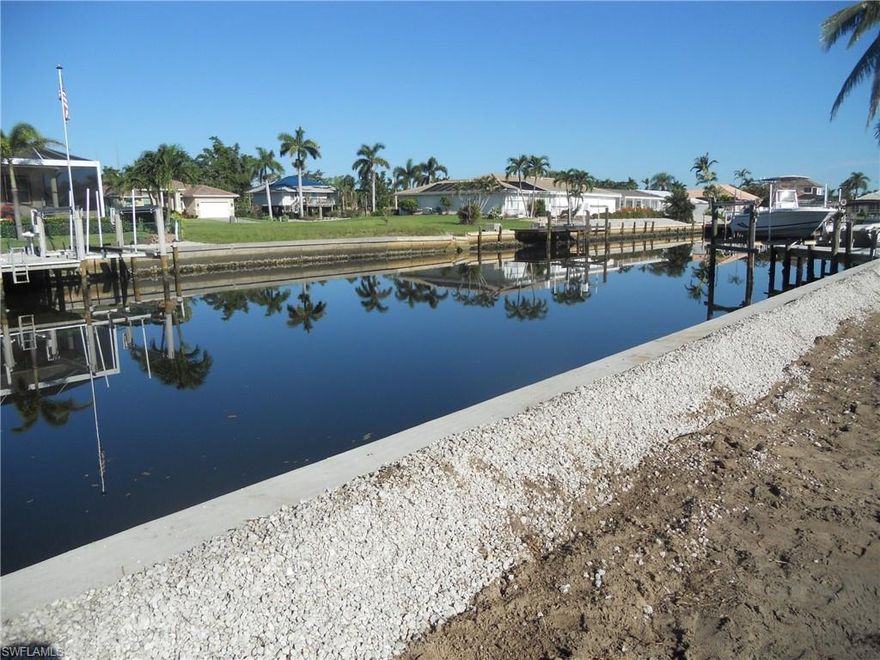 NEW SEAWALL 2018.  DESIRABLE WESTERN EXPOSURE VACANT HOME SITE, ALL YEAR SUNSET VIEWS, GULF ACCESS VIA ROBERTS BAY ON THE SOUTH SIDE OF MARCO ISLAND, BUILD YOUR DREAM HOME HERE.