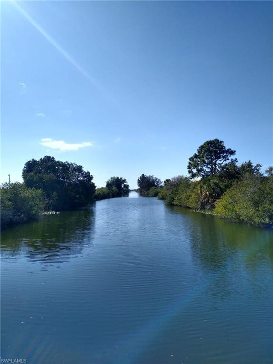 Nice canal lot in area of newer homes.