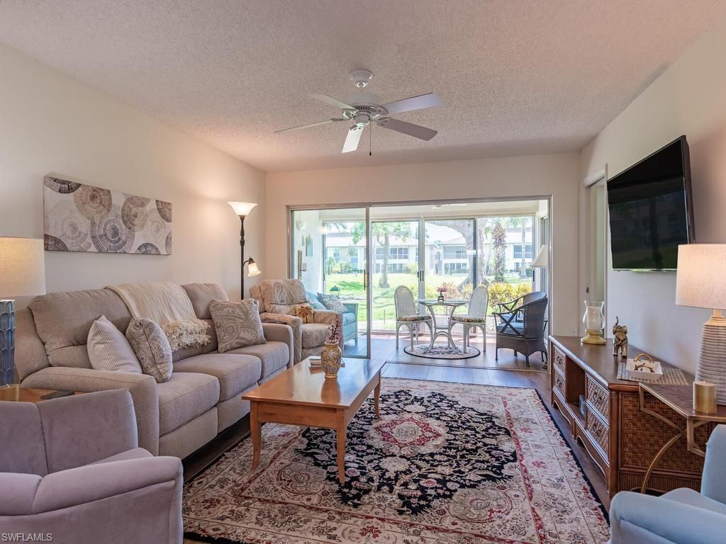 Photo of 325 Charlemagne BLVD #C104, NAPLES, FL 34112 (MLS # 226015868)