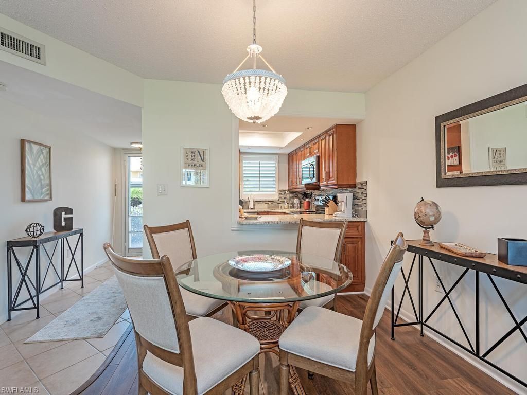 Photo of 325 Charlemagne BLVD #C104, NAPLES, FL 34112 (MLS # 226015868)