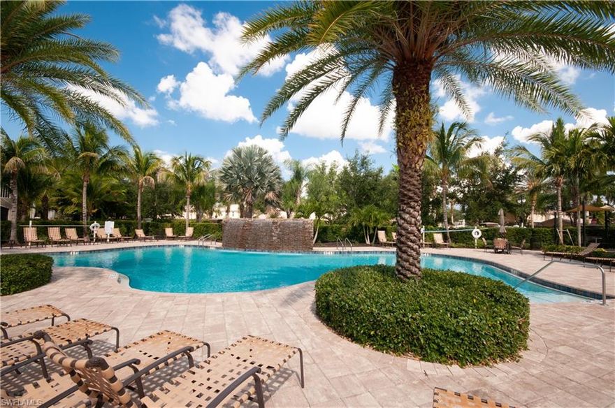 LAKE VIEW.  Like NEW (lived in 3 weeks per year). End unit-open floor plan.  One car garage, two car driveway.  Stainless steel kitchen appliances.  Granite counter tops in kitchen and bathrooms. Tiled floor to ceiling bath tub and shower.  42" upper kitchen cabinets.  18" diagonal tiled floors and upgraded carpeting in all three bedrooms.  Baseboards and crown moldings.  Washer and dryer.  IMPACT GLASS windows and sliding glass doors.  Walk-in pantry.  Storage closet off lanai.
Maintenance free, resort style amenities:  Pool/waterfall, fitness room, social room, bocce court.  
Gated and convenient to everything (1.5 miles to shopping, dining, 15 minutes to beach) LOW traffic.
Hi-speed internet, cable TV, water, insurance, pest control, rec facilities, master association all INCLUDED in HOA fees only $463. per month.  May be the BEST Price/Value community in the Naples-Bonita Springs area.  Newer (built 2016) LOW HOA fees, convenient.