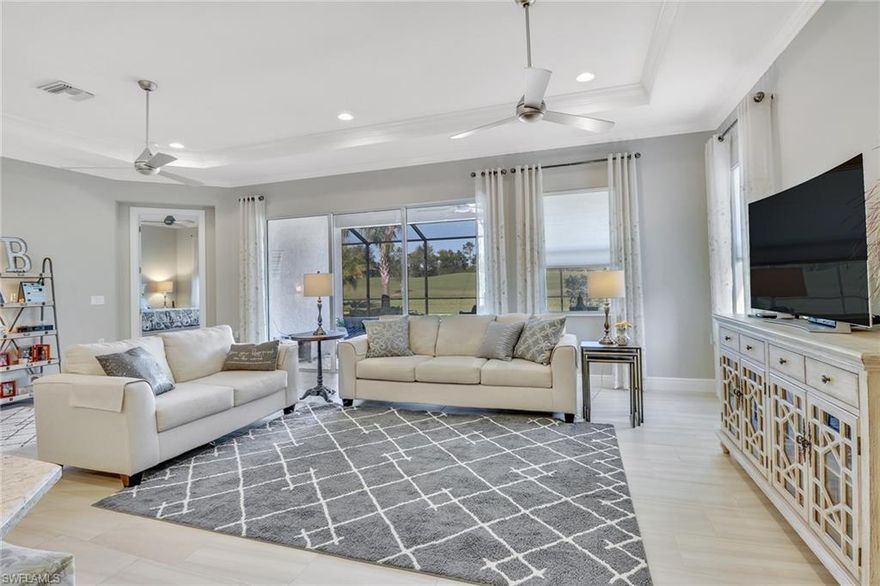 BELOW COST! WCI Quality Home perfectly sized for the busy lifestyle you will enjoy at Pelican Preserve! Tucked away 100 Feet from any prying eyes and golf balls of the Golfers on the 2nd fairway of the Ibis Course. EVERY OPTION AVAILABLE in the Bimini Model has been expertly built into this home! 8 Foot Doors with larger frames, luxury baseboards and crown molding add to the architectural design of this home. Spectacular granite, gorgeous cabinetry, built-in double ovens, 36" Cooktop and a stainless Vent hood that is vented outside make the kitchen a chefs dream space! Plenty of room for the grand kids in the den and their parents in the private guest room. The Lanai is is a special place with a Salt Water pool and plenty of room under cover for dining alfresco. For total privacy and protection just lower the Storm Smart electric panels on the Lanai by remote or APP.  Located for away from traffic noise and community traffic creates a quiet sanctuary for relaxing after a long day enjoying the massive amount of amenities Pelican Preserve offers!
See it NOW!