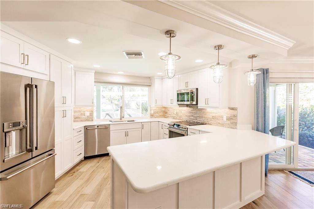 Photo of 1590 Sandpiper ST, NAPLES, FL 34102 (MLS # 226010003)