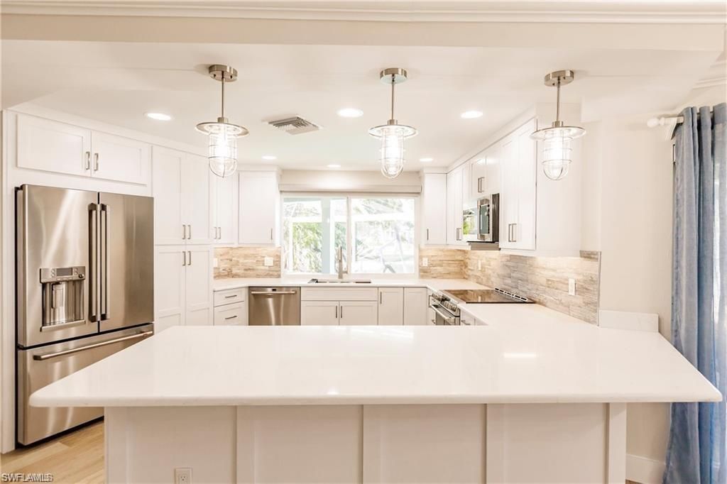 Photo of 1590 Sandpiper ST, NAPLES, FL 34102 (MLS # 226010003)