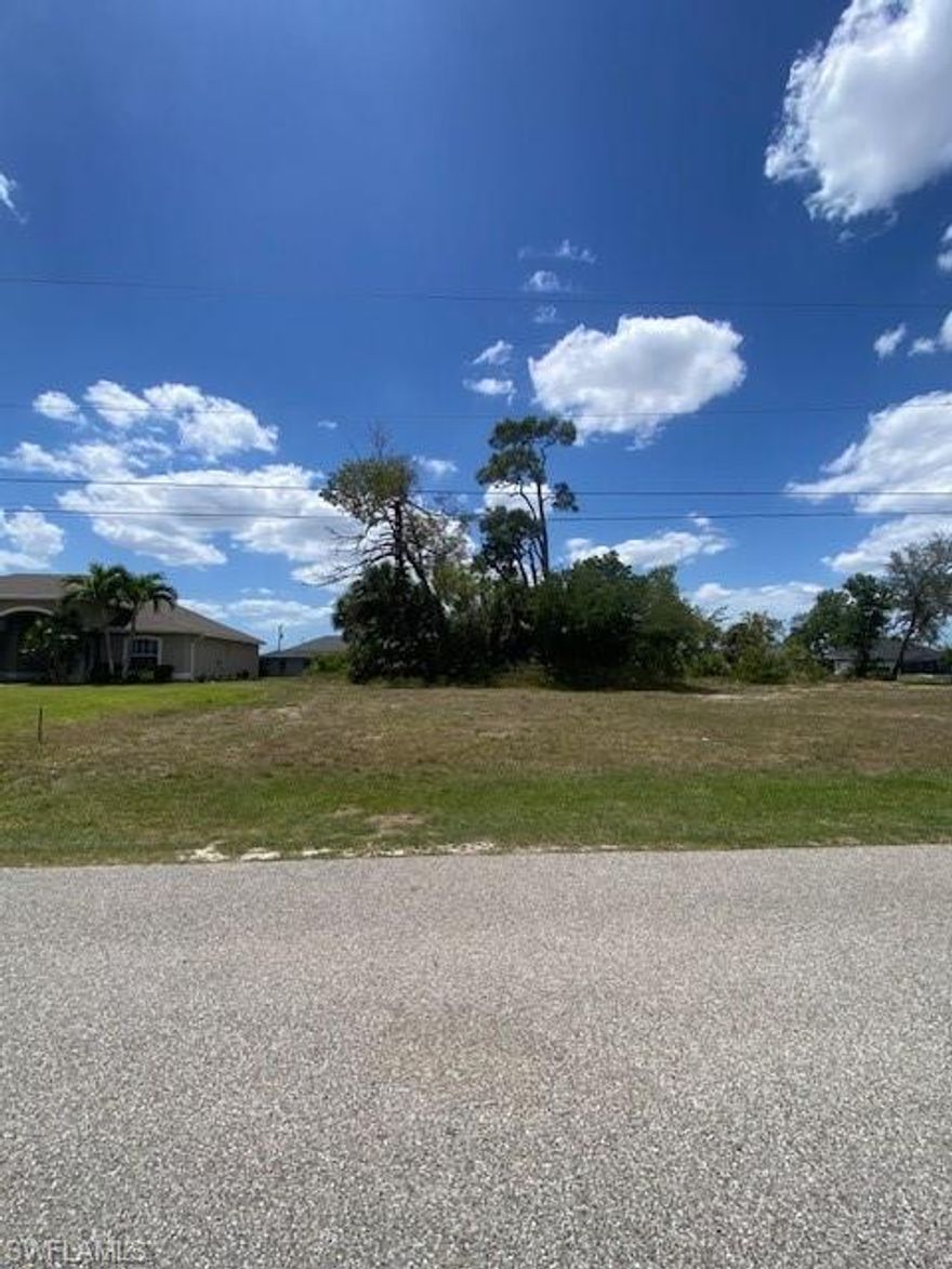 Freshwater canal lot in a growing Cape Coral area with city water, sewer, and irrigation in place. Excellent opportunity for a builder, investor, or buyer looking to build, with a low assessment balance.The canal is mostly clear of vegetation, with only a few bushes at the rear of the property, creating a peaceful waterfront setting for your future home.  Conveniently located near Joe’s, Publix, Carrabba’s, Bonefish Grill, USPS, self-storage facilities, fitness centers, gas stations, and multiple restaurants. If desired, we can also connect you with trusted local builders.