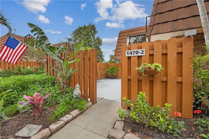 Beautifully remodeled &  centrally located town-home featuring a bright open-concept floor plan and stylish upgrades throughout. Completely remodeled in 2023, this spacious 3-bedroom, 2.5-bath home showcases wood-look tile plank flooring, a beautifully updated kitchen with a large waterfall island, and modernized bathrooms. The generously sized bedrooms offer comfort and functionality, complete with blackout curtains, extended closet space, and private balconies overlooking a fenced courtyard—perfect for relaxing or entertaining. Major updates provide peace of mind, including a new roof, AC system, and fencing, all completed in 2023. Enjoy the benefits of a low HOA fee of just $250 per month and convenient access to the heated community pool just a short stroll away. Ideally located just minutes from downtown Fort Myers, with easy access to shopping, dining, and medical facilities. Situated in Zone X, this property does not require flood insurance—an added advantage for homeowners.