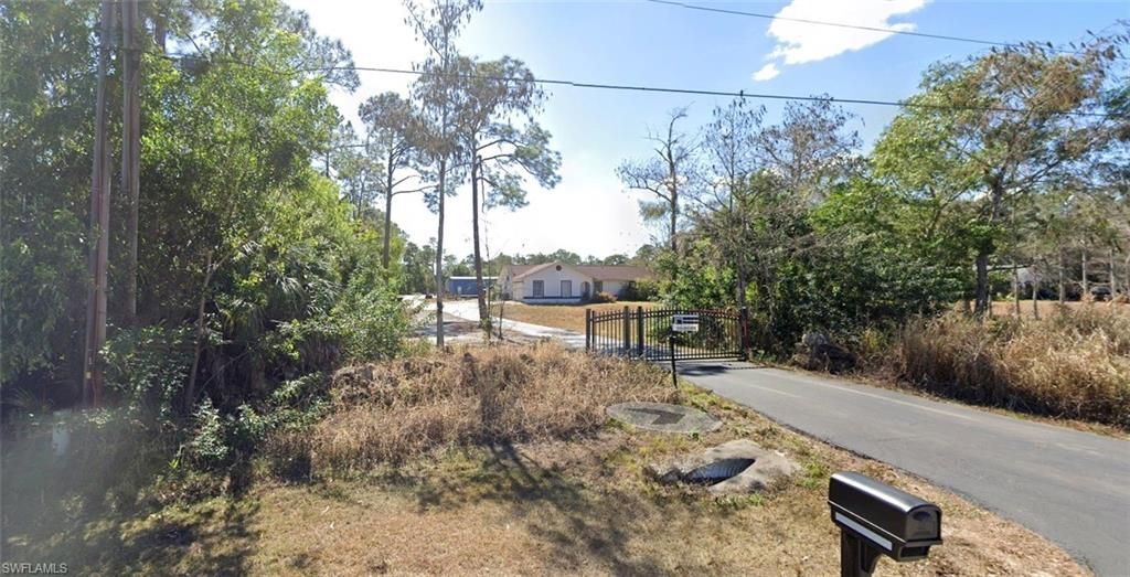 Photo of 1750 24th AVE NE, NAPLES, FL 34120 (MLS # 226010757)