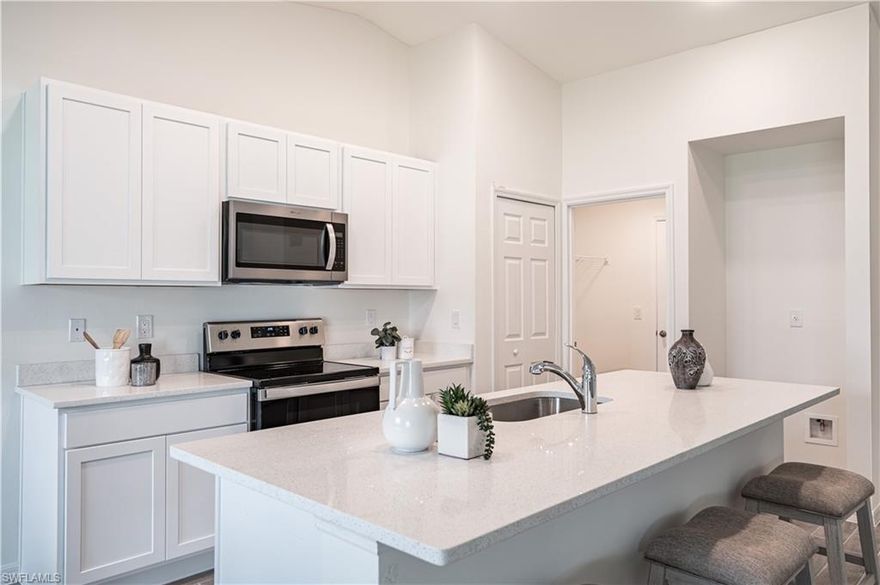 NEW BUILD - Anticipated completion date is March 6, 2026.  SPECIAL INCENTIVES: 4.75% fixed rate FHA/VA financing with closing cost assistance OR up to $18K in closing cost assistance / prepaids when using a preferred lender. The 1,650-square-foot (air-conditioned) Fairfield plan is an open-concept floor plan that includes four bedrooms, two bathrooms, and a two-car garage. The kitchen of the Fairfield boasts many contemporary features, including upgraded 36” contemporary shaker-style cabinets, a large 8’ wide kitchen island with upgraded countertops, Whirlpool dishwasher, microwave, and range, and overlooks an expansive great room, making it the perfect plan for entertaining and day-to-day living. The great room and dining room feature beautiful tile-plank flooring and vaulted ceilings. The owner’s suite features a private bathroom, with a separate water-closet room, double-sink vanity, separate linen closet, and large walk-in closet. The three guest bedrooms share a separate bathroom. The Fairfield also features a decorative brick paver driveway, a professionally designed landscaping package, and designer-selected paint colors, light, and plumbing fixtures, impact resistant window and doors.