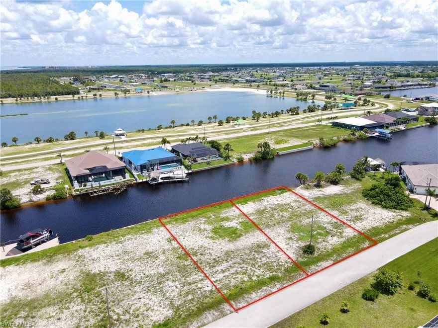 Welcome to your slice of Florida paradise—this vacant lot in the peaceful NW Cape is the perfect canvas to build your dream waterfront home. With a newer seawall (2022) already in place and direct sailboat access to the Gulf (no bridges!), this property is ideal for boating and fishing enthusiasts alike. Nestled in the quiet, but convenient, Old Burnt Store area, you’ll enjoy tranquil views, miles of navigable canals, and easy access to everything Cape Coral has to offer — dining, shopping, entertainment, and top-rated schools are just minutes away. Bonus Opportunity: The adjacent lot is also available, offering the potential for an expansive estate or investment opportunity. Don’t miss your chance to own a piece of prime Gulf-access property in one of the most desirable areas of Cape Coral!