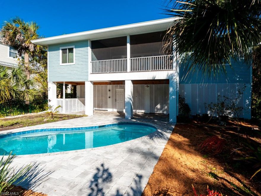 Built in 2018, this impeccable home is practically new! Since construction, it has been meticulously maintained by the current owners. Mature landscaping and a fenced backyard create a great amount of privacy. High living area ceilings, wood cabinets, stainless steel appliances, and granite countertops are only a few of the features of this outstanding home. The master bath features dual vanities and a beautiful walk-in shower. The screened lanai overlooks the pool and the well established landscaping. The split floor plan with enclosed stairs to the well utilized garage and storage area creates every convenience. Situated on a quiet shell road, the house is just minutes to the Sanibel School, Recreation Center, and bike path. This is an amazing opportunity to enjoy new construction and a fabulous location on the west end of the island.