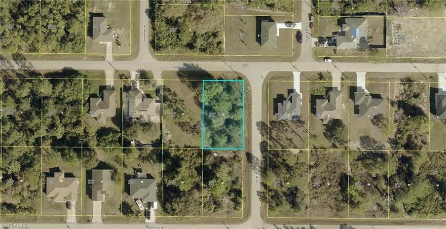 Corner Lot!!! It is NOT in a flood zone, and it has Paved Roads, and many new other construction homes are being built in this growing area of Lehigh Acres in SW Florida... Make An Offer Today! SAME SELLER OWNS 2 LOTS and will entertain a package.