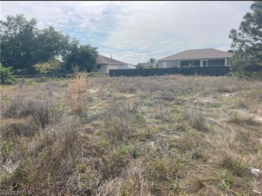 Discover the perfect setting to build your future home on this spacious 0.28-acre lot in the growing community of Lehigh Acres. Larger than a standard quarter-acre and situated in Flood Zone X (no flood insurance required), this property is mostly cleared and ready for your vision. Enjoy excellent accessibility with direct routes to Lee Blvd, placing you just minutes from schools, shopping, dining, I-75, and everyday conveniences.
Nestled among established residences and brand-new builds, this location combines a peaceful neighborhood feel with exciting growth potential. With no HOA fees or deed restrictions, you’ll have the freedom to design a home that truly fits your lifestyle. Whether you’re planning your forever residence or looking for a smart purchase in one of Southwest Florida’s fastest-developing areas, this lot offers endless possibilities.
