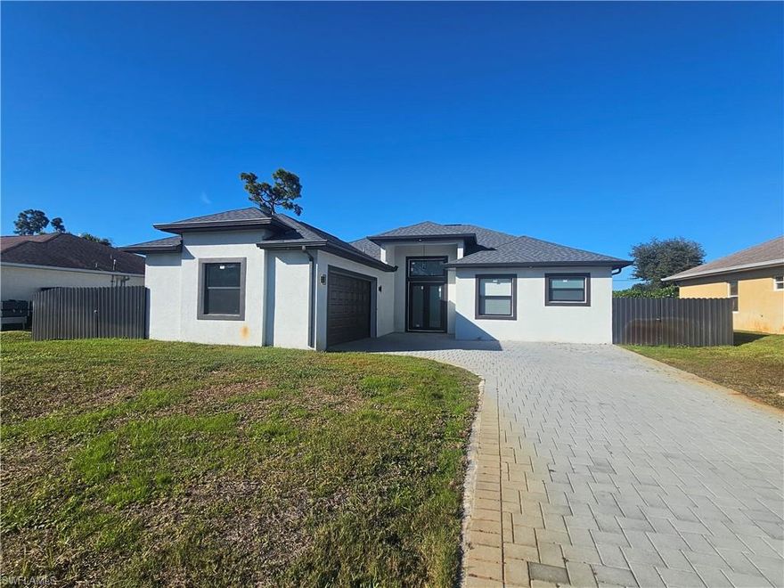 Welcome to this stunning, newer-construction home built in 2023, ideally located in San Carlos Park, just minutes from shopping, dining, schools, Gulf Coast beaches, and major highways.
This 3-bedroom, 2-bathroom home plus a den offers a bright, open floor plan with tile flooring throughout, high ceilings, and modern finishes that make it both stylish and easy to maintain.
The kitchen features wood cabinetry, quartz countertops, and stainless steel appliances, perfect for everyday living and entertaining. The home has been recently painted inside, giving it a fresh, move-in-ready feel.
The spacious primary suite includes his-and-hers oversized walk-in closets and a comfortable layout designed for privacy and relaxation.
Enjoy peace of mind knowing this home is located in a NO flood zone. The backyard offers ample space for a future pool, making it easy to customize your outdoor living area.