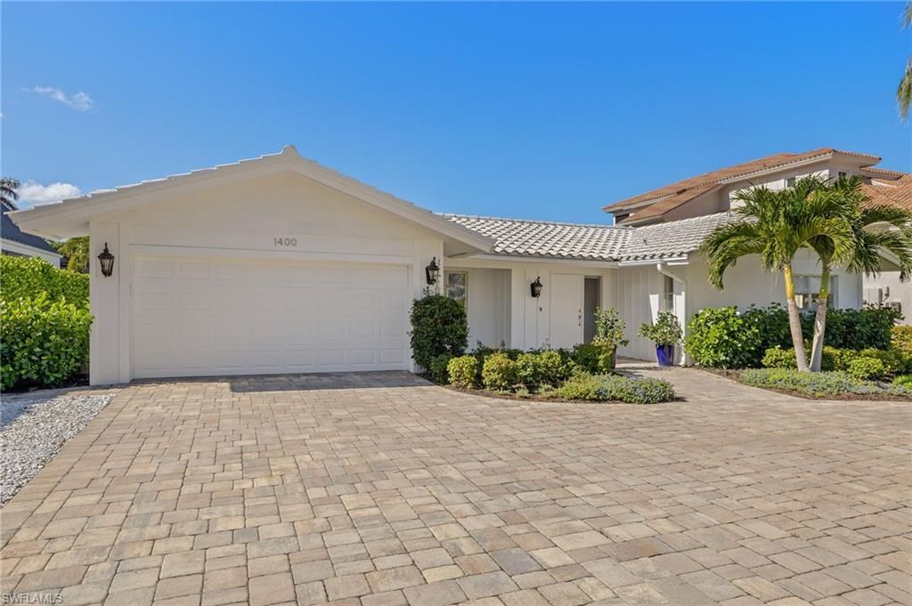 Photo of 1400 MARLIN DR, NAPLES, FL 34102 (MLS # 225039177)