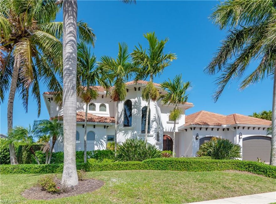 Welcome to luxury living on Marco Island. This 4 bedroom home with a 3 car garage has everything one could want in a home. Starting with direct access, the location of this property is ideal for someone looking to spend time on the water. With quick access to the Marco River, this location is perfect for the avid fisherman or the recreational boater. The home is a terrific primary residence or would make a terrific investment property. The home was constructed with a desirable first floor primary bedroom. It also boasts an open kitchen concept and a large lanai, terrific for entertaining. With high ceilings and the ability to open the sliders to the lanai , the home feels even bigger than it is. The home has been updated with a new roof in 2020. The exterior of the home was painted in 2021. The home comes with a 25,000 lb lift as well as 2 wave runner lifts and a large dock. The home has a pool and spa and pavers in both the front and back of the home. The home also has impact glass. This is a must see!