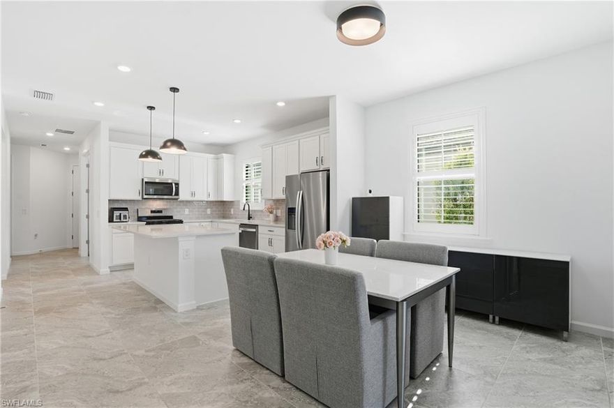 Welcome to this newly constructed, custom Pulte home located in the highly sought-after, gated community of Terreno. This thoughtfully designed two-bedroom plus den residence offers western exposure with serene lake views, providing the perfect setting for breathtaking sunset evenings. The home is partially furnished and features quality upgrades throughout, including impact-resistant windows and doors, plantation shutters, and tile flooring throughout with no carpet. The open, light-filled floor plan is ideal for both everyday living and entertaining. Plenty of room to build your dream oasis in the backyard ! Residents enjoy full access to the Terreno amenity campus, highlighted by a 15,000-square-foot clubhouse with a state-of-the-art fitness center and community gathering spaces. Outdoor amenities include a resort-style pool, lap pool, spa, fire pit, tennis and pickleball courts, golf amenities, playground, and dog parks. The community is also home to Olive & Thyme, a full-service restaurant and bar, offering convenience and a true resort-style lifestyle. Experience the feel of luxury living—millionaire-style amenities at less than half the budget. With a brand new Publix directly across the street convenience is key! This home presents an exceptional opportunity to enjoy new construction, modern upgrades, an amenity-rich Naples resort style living!