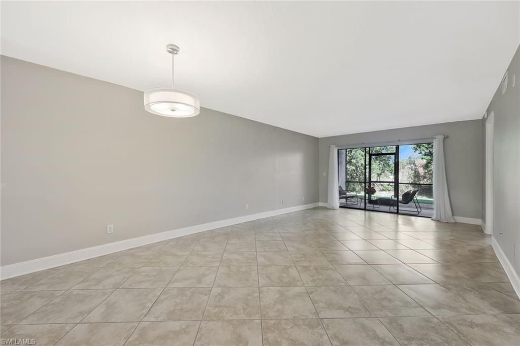 Photo of 1211 Rosemary CT #C104, NAPLES, FL 34103 (MLS # 225077654)