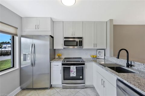 Photo of 1211 Rosemary CT #C104, NAPLES, FL 34103 (MLS # 225077654)