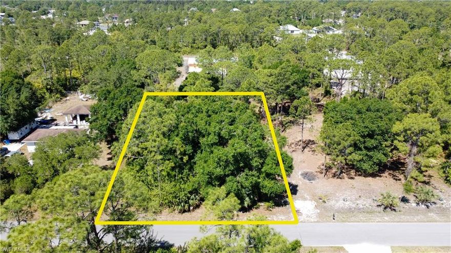 Oversized half-acre lot w/WESTERN EXPOSURE located in a peaceful and rapidly growing area of Lehigh Acres, offering plenty of space to build your dream home with room for a pool, detached garage, or garden. Zoned for residential use with no HOA restrictions, this property provides the freedom and flexibility to create a custom living space tailored to your needs. Flood Zone X for further peace of mind! Two sides of the lot are already fenced, adding value and convenience as you plan your future home. Fiber optic internet has recently been brought into this area, ensuring fast and reliable connectivity—perfect for work-from-home lifestyles or streaming entertainment. Situated on a quiet paved road, yet just a short drive to schools, parks, shopping, dining, and major roadways, this lot offers the perfect balance of privacy and convenience. Whether you're ready to build now or invest for the future, this is a fantastic opportunity to own a large piece of land in one of Southwest Florida’s most up-and-coming communities.
