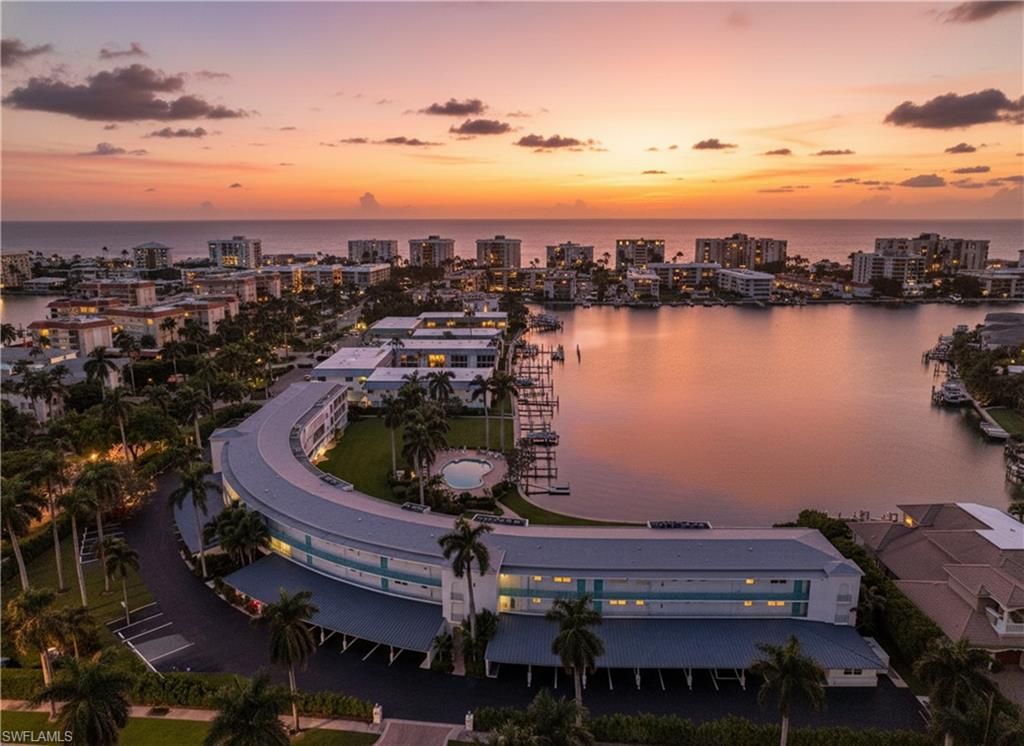 Photo of 383 Harbour DR #309, NAPLES, FL 34103 (MLS # 225076192)