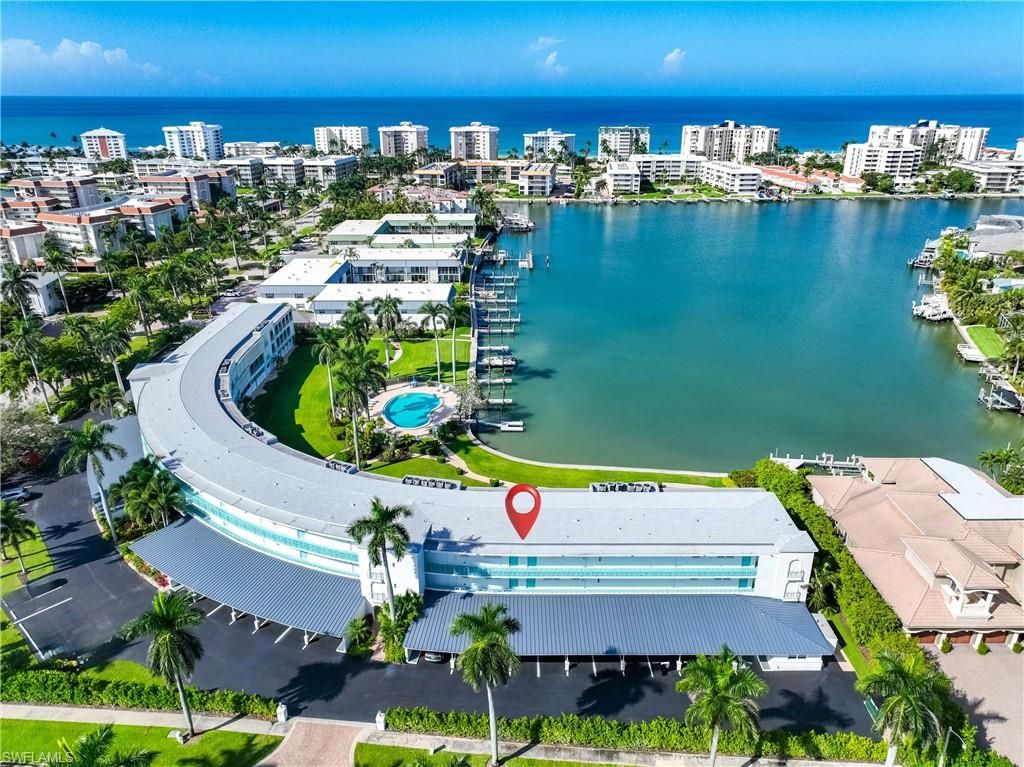 Photo of 383 Harbour DR #309, NAPLES, FL 34103 (MLS # 225076192)