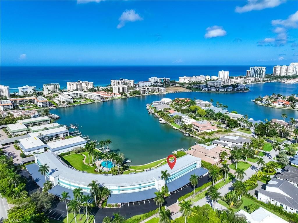 Photo of 383 Harbour DR #309, NAPLES, FL 34103 (MLS # 225076192)