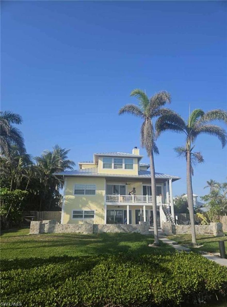 Beutiful Key West home with sunset views over looking with the bay with preserve views.  This home has been updated and includes remodeled kitchen.