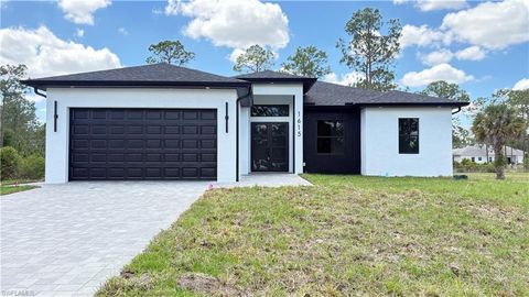 Photo of 1615 Plumosa AVE, LEHIGH ACRES, FL 33972 (MLS # 226014040)